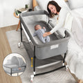 4 in 1 Adjustable Baby Bassinet with Changing Table, Storage Basket, Wheel, Mosquito Net B9678